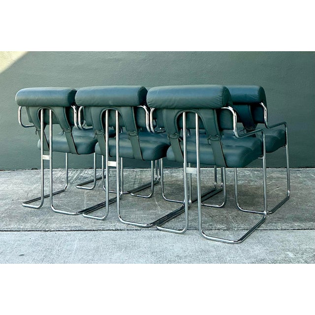 Designed by the visionary Guido Faleschini for the esteemed “Tucaroma” series, this set of six dining chairs represents...