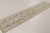 This vintage 3x11 Turkish runner is a refined hand-knotted wool weaving dating to circa 1950–1960. The piece features a...