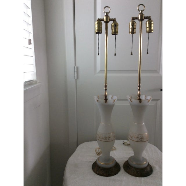 Pair of Opaline and gold trim antique lamps. Great for any decorators staging and props. Also, your own home decor.
