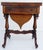 For sale is a good quality Victorian rosewood games table. The table has an inlaid top which swivels and folds over to...