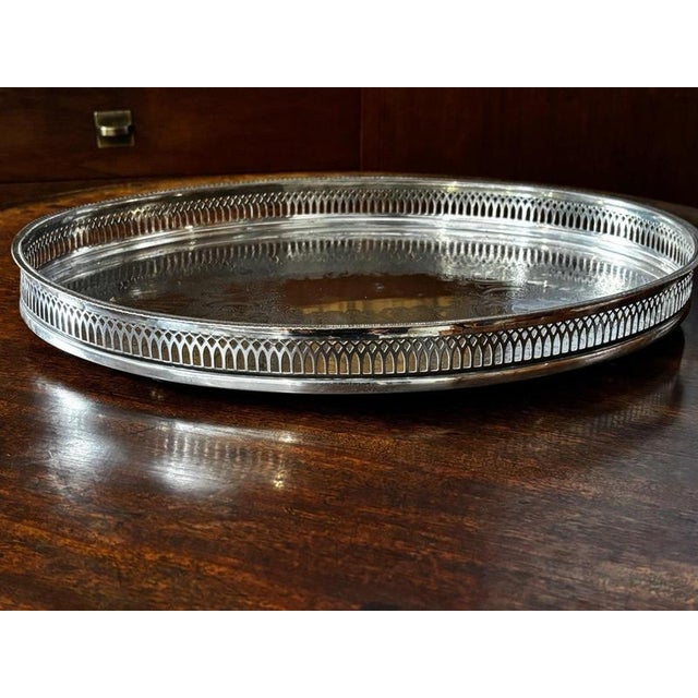 Large Silver Plate Gallery Drinks Tray. Sizes 41.5 x 32 cms, 5 cms tall. Is a used item so will have signs of use and wear.