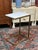 Design Plus Gallery presents a pair of C-Tables of Brass and Marble. The tables have a shape that works well as side...