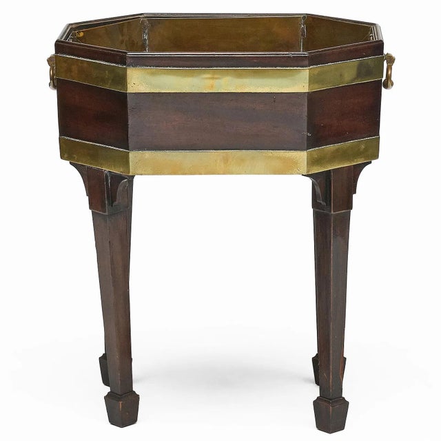 Antique 18th century George III mahogany brass bound octagonal wine cooler on later stand. May be used as a jardiniere for...