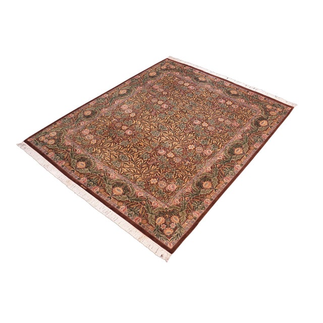 Designed with mesmerizing intricacy and gorgeous color palette, this hand-knotted masterpiece demonstrates the beauty and...