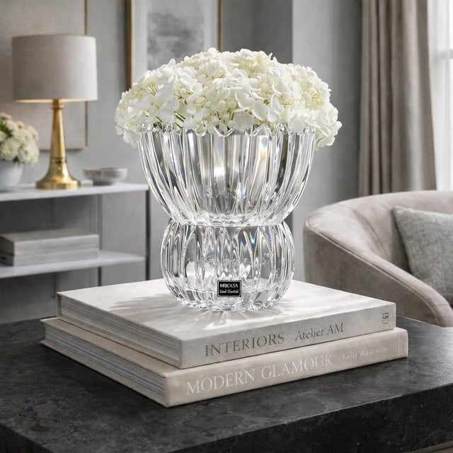 A striking example of late 20th century European crystal design, this Mikasa “Ice Palace” lead crystal vase features a...