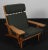 Hans j. Wegner lounge chair with loose cushions new upholstered with green magrethe wool from nevotex. Frame of oak. With...