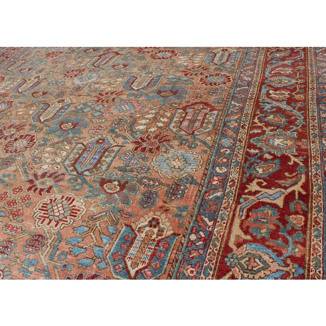 Early 20th Century Antique Persian Bakhtiari Rug Featuring Repeating Floral Motifs and Rich Red 10 X 12 For Sale - Image 5 of 12