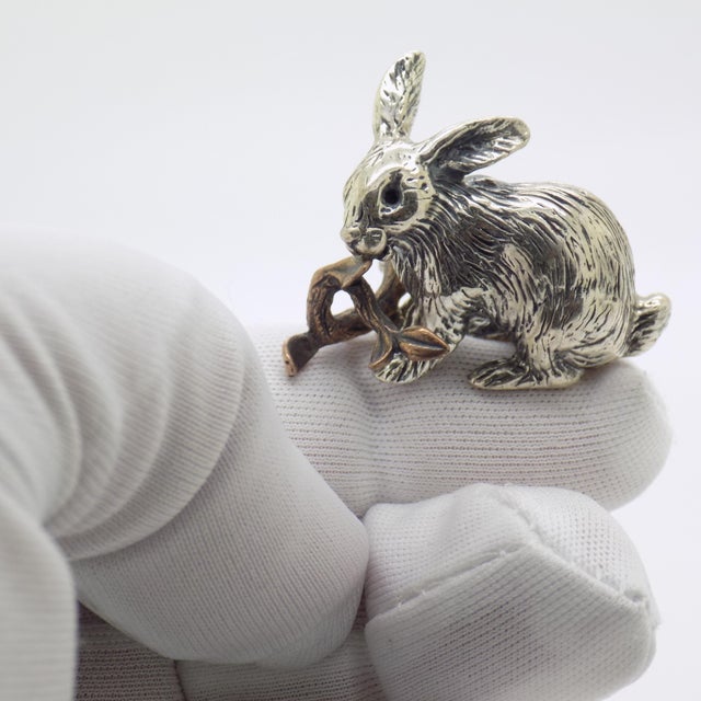 A delicate and expressive miniature, this vintage Italian piece depicts a bunny rabbit gently interacting with a small...