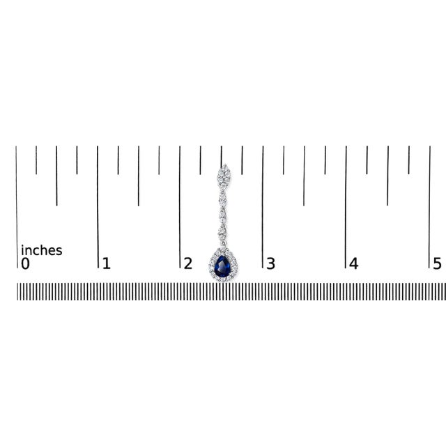Early 21st Century 18K White Gold 1 3/5 Cttw Diamond and 7X5 MM Pear Shaped Blue Sapphire 1 1/3 Inch Drop and Dangle Halo Earrings (G-H Color, VS1-VS2 Clarity) For Sale - Image 5 of 5