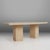 This French travertine dining table from the 1960s is a sculptural celebration of mid‑century modern design, where natural...