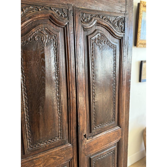 A truly beautiful 18th-century French oak cabinet with the kind of presence that stops you in your tracks. Crafted in...