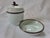 An exquisite, mixed-material decorative porcelain lidded pot and matching saucer set crafted by the historic Royal Limoges...