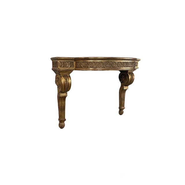 This fine & rare gilt-wood Louis XVI bracket, in the form of a console table.
