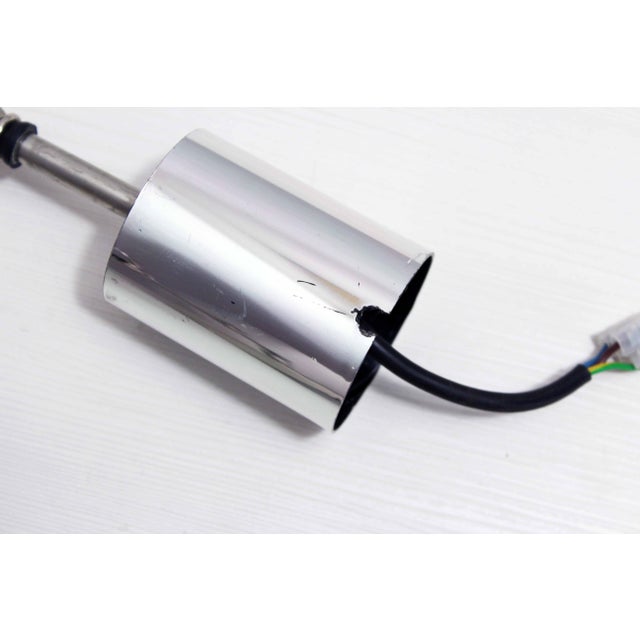 Superb pendant light in glass and chrome metal This pendant light designed in the 70s is truly original with its 3 bulbs...