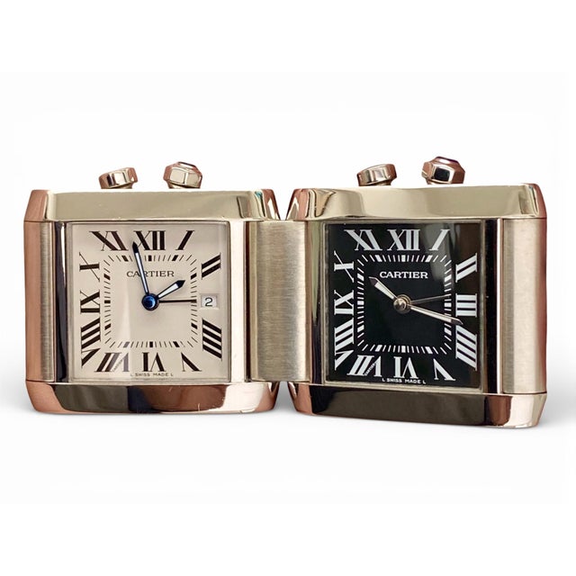 A refined dual-time desk and travel clock produced by Cartier as part of the Tank Française line. Ingeniously constructed...