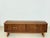 This stylish sideboard is for sale, boasting a timeless design with a beautiful wood grain and characteristic, slightly...