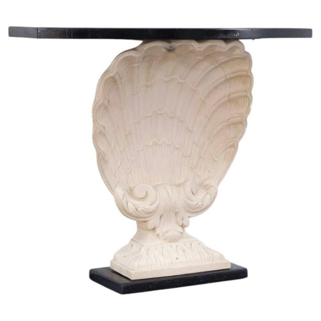 Grosfeld House Shell-Form Console Table. Grosfeld House was an important New York furniture maker and retailer whose work...