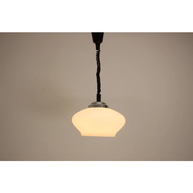 Made in Czechoslovakia. Made of glass, metal 1x E27 or E26 socket. Measures: Adjustable maximal height 120cm. Re-polished....