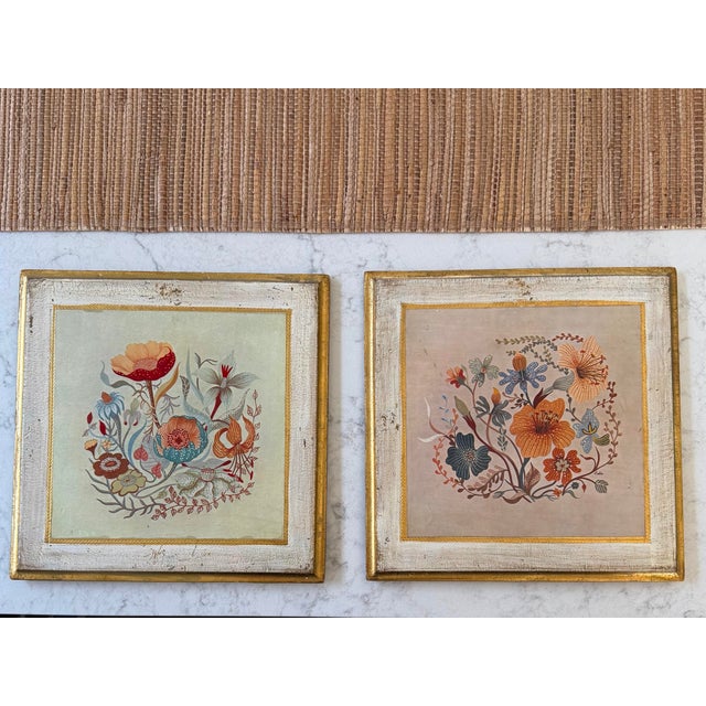 Pair of vintage Florentine wood wall plaques, crafted in Italy, circa mid 20th century. Each piece features a different...