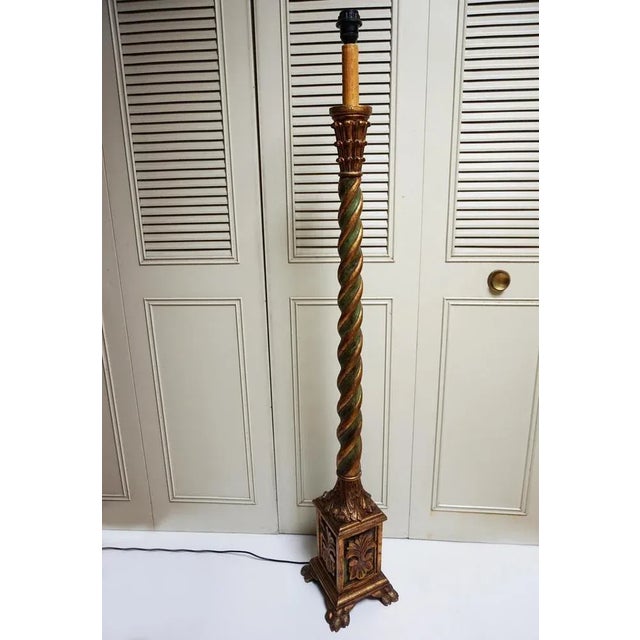 - A beautiful floor lamp that was made in the Italian region of Florence, circa 1950. - The lamp is made in hand carved...