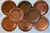 Set of 8 vintage hand made and hand hammered copper charger plates or decorative underplates with rolled edges. Varying...
