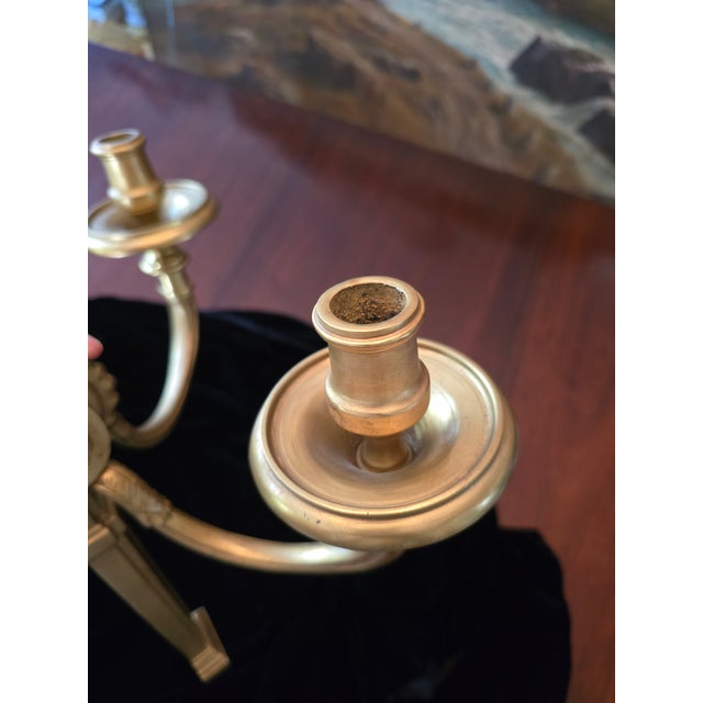 A good pair of vintage mid century era gilded pair of bronze sconces. Having a rich gilt ormolu patina now nicely aged by...