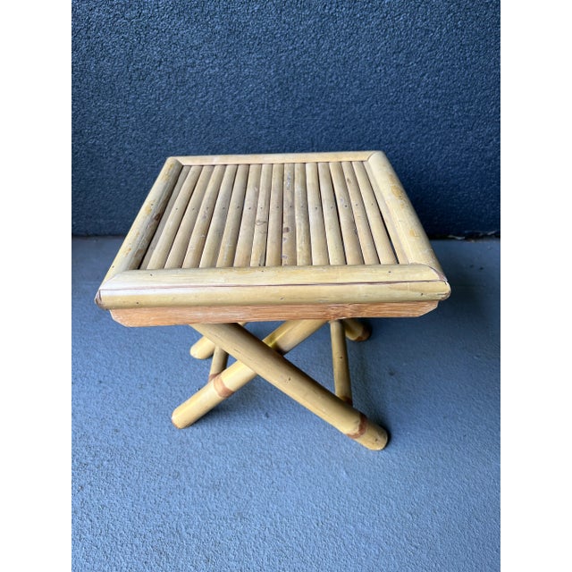 Vintage bamboo plant stand or table riser. Table top measures 11”x11” 11” height.