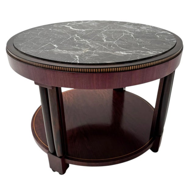 Magnificent and rare Art Deco coffee table or cocktail table. Striking French design from the 1930s. Solid purple heart...