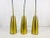 Set of three very rare pendant lamps made in Germany in the 1950s. The lighting is made of brass and has the style of the...