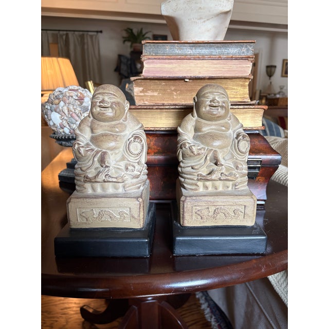 Infuse your space with joy and spiritual charm. This vintage pair of Chinoiserie bookends features the iconic Laughing...