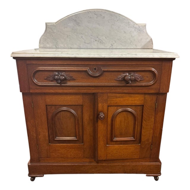 Antique Victorian Eastlake Walnut Marble Top Washstand With Carved Acorn Pulls, Circa 1880s For Sale