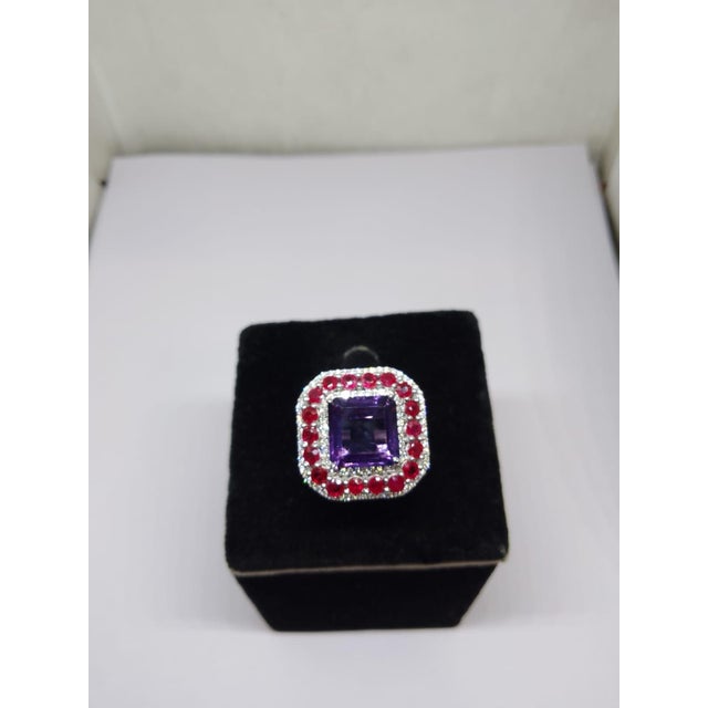 Gemstone details Gold Purity: 14K Solid Gold Ruby: 2.30 cts Diamond: 0.50 cts Amethyst: 5.53 cts 14K gold Net weight: 4.20...