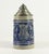 An impressive lidded beer stein/tankard Salt glaze stoneware with birds, a fox and a dog in movement, among foliate cobalt...