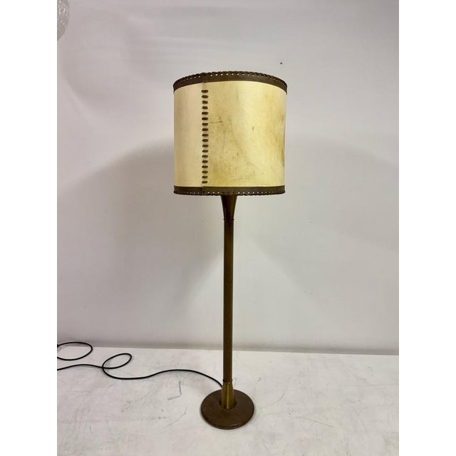 Leather-Wrapped Floor Lamp with Parchment Shade, Attributed to Charlotte Wawer, Germany, 1950s An elegant and sculptural...