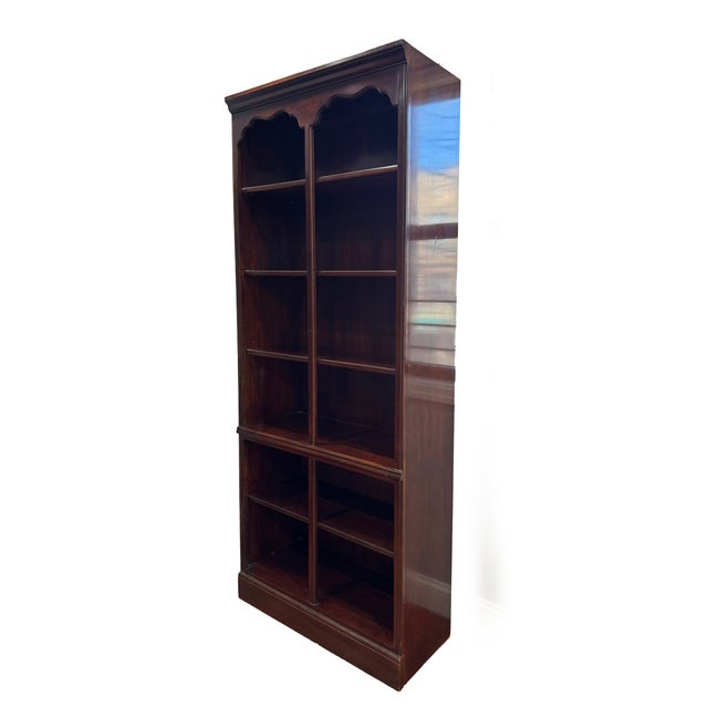 Tall open bookcase from Drexel Heritage’s Carlton Cherry collection. Crafted in rich cherry wood with classic scalloped...