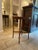 A refined vintage Grand Rapids side table crafted from solid mahogany, featuring a warm, rich tone and a classic oval...