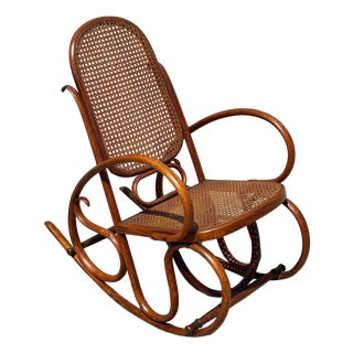 Antique Vienna Secession Cane & Bent Oak Scrolling Children Sized Rocking Chair, Attributed to Thonet For Sale