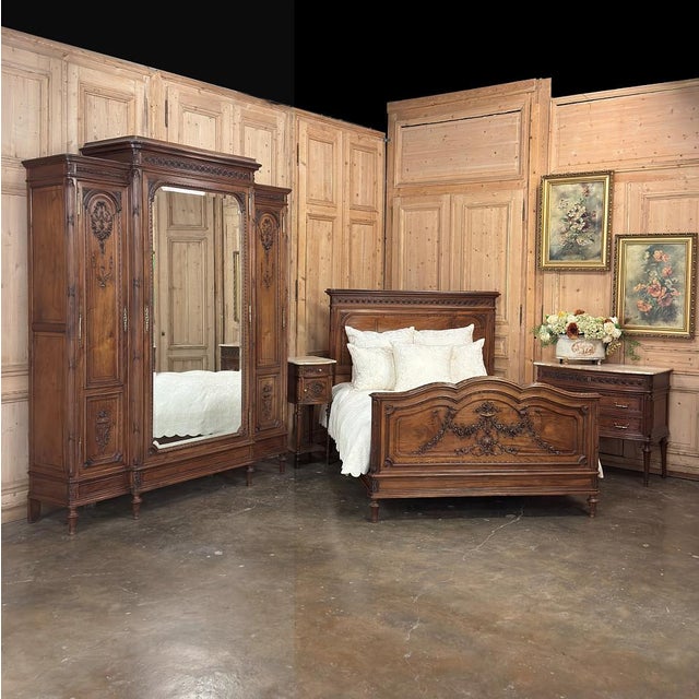 19th Century French Louis XVI Walnut Bed accepts a full size mattress set with ease! Hand-crafted from select French...