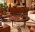 This round coffee table is distinguished by its magnificent ceramic tile top, adorned with a particularly expressive...