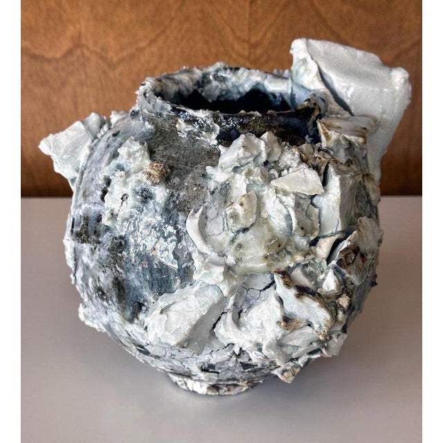 A stoneware moon jar made by Akiko Hirai (1970-) made in 2025. In the artist's signature style, the jar was potted on the...