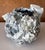 A stoneware moon jar made by Akiko Hirai (1970-) made in 2025. In the artist's signature style, the jar was potted on the...
