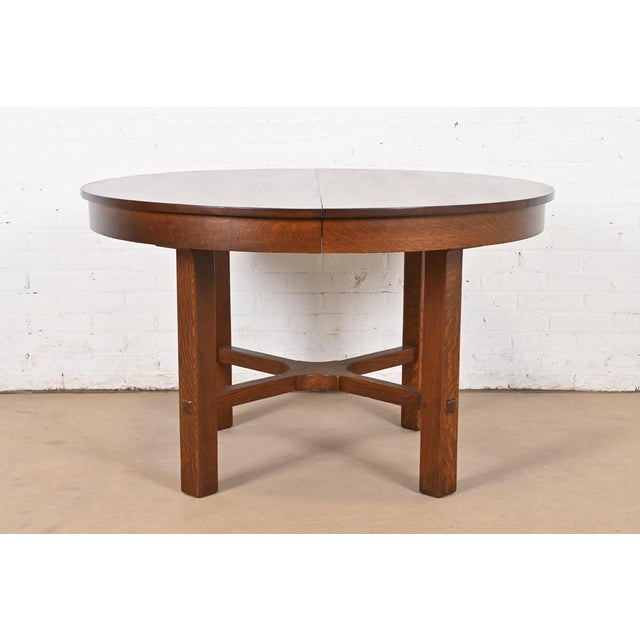 An exceptional antique Mission or Arts & Crafts period quarter sawn oak extension dining table By L. & J.G. Stickley USA,...