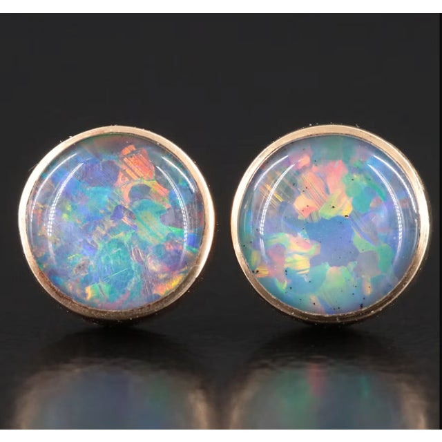 VINTAGE Minimalist at its finest, this beautiful pair of 14k Opal Stud Earrings check the box! Materials: 14K Gold Stud...