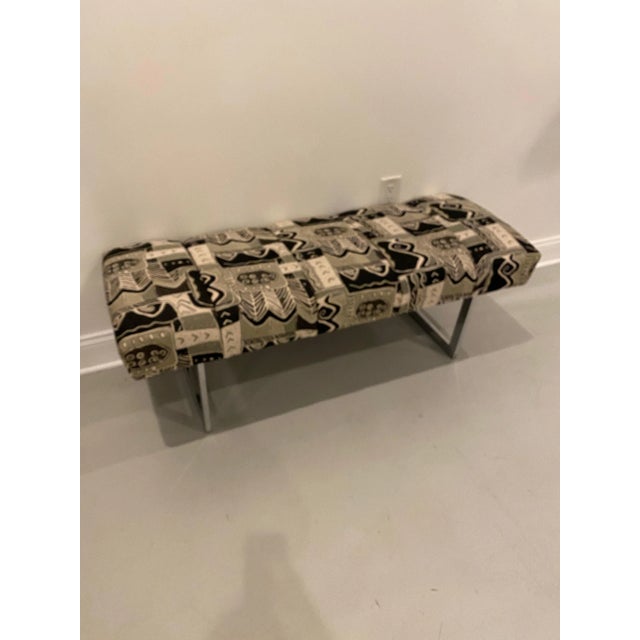 Mid-Century Modern chrome bench with pair of matching throw pillows.