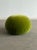 W26 D26 H17 An artisanal floor ottoman defined by its perfect, bulbous form and vibrant chartreuse velvet. This piece...