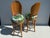 Pair of hand carved shell back Venetian Grotto style swiveling bar stools newly reupholstered in Palm Beach Regancy...