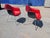 We currently have 2 red Eames Herman Miller Padded arm shell chairs. Vibrant original red Naugahyde upholstery! Date...