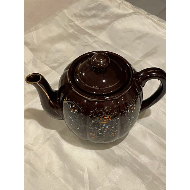 VINTAGE TEAPOT BROWN BETTY RED-WARE. Moriage Enamel HandPainted with Lid. It is made in Japan. It’s made with red clay for...
