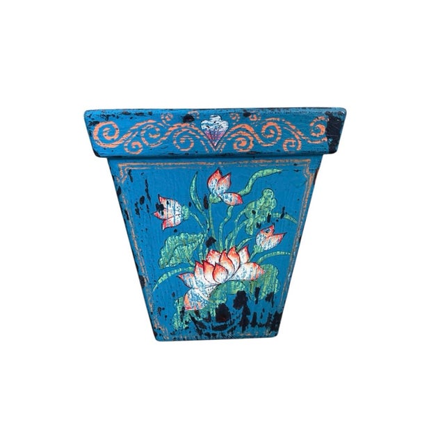 This vintage Balinese vessel is crafted from solid wood and features a distinctive tapered silhouette. The exterior is...