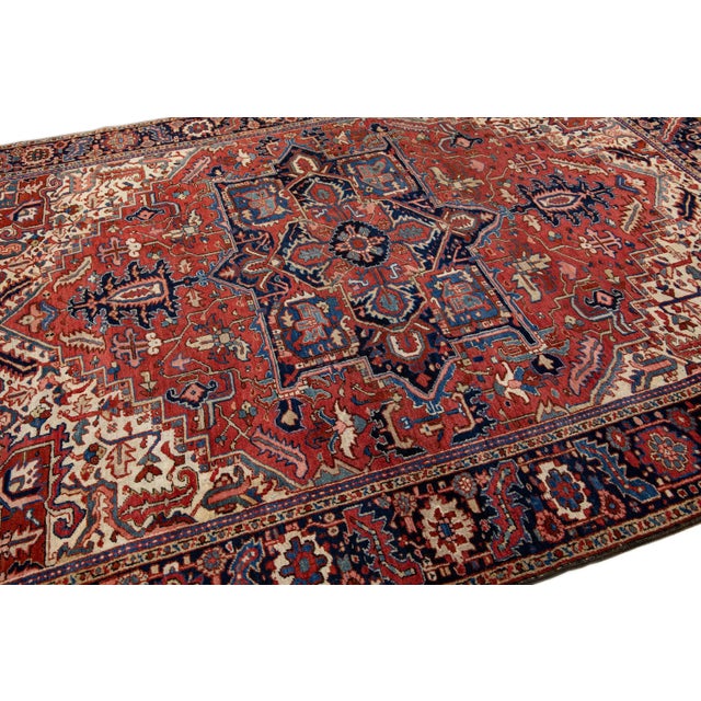 Textile Antique Persian Heriz Handmade Red Wool Rug With Medallion Motif For Sale - Image 7 of 11